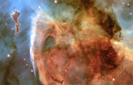   The Keyhole Nebula as imaged by the Hubble Space
 Telescope Wide Field Camera in 1999. This region of sky was imaged through six
 separate filters of different
colors that were then combined to produce this true color image of a region
in the southern skies where new stars are forming out of clouds of gas and dust.
The region lies about 8,000 light years from Earth.