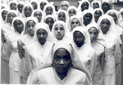 Muslim women dressed in full garb at Temple No. 2 in Chicago 1963.