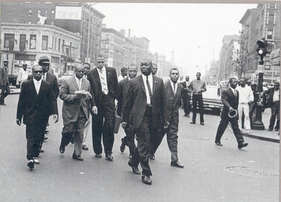 Malcolm with Fruit of Islam guards on the streets of Harlem