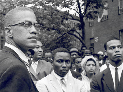 Malcolm and Minister Louis X (now known as Minister Louis Farrakhan)